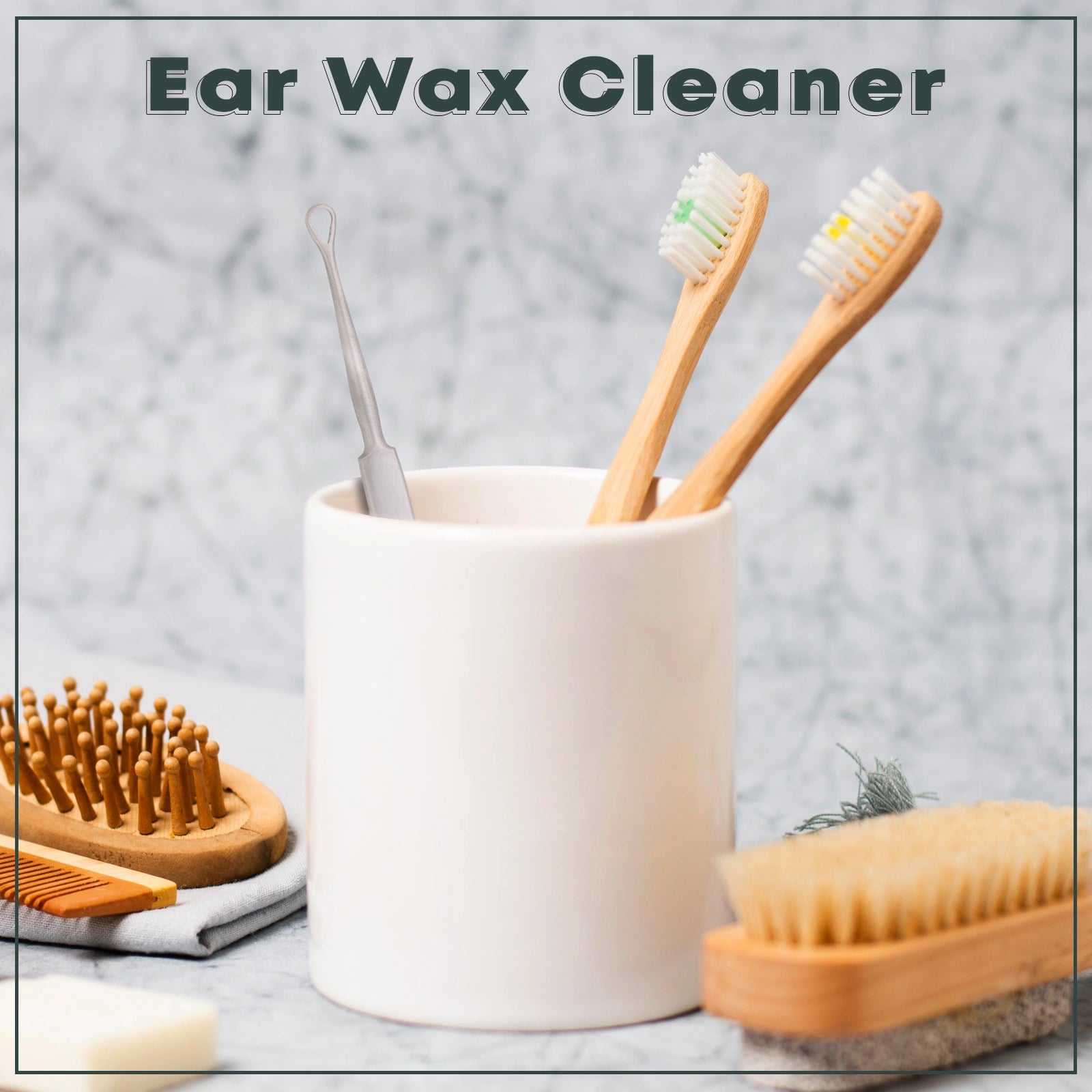 Stainless steel ear wax cleaner tool placed in white cup with toothbrushes and grooming accessories by Styleup Beauty Tools